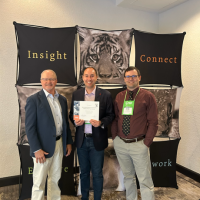 Kurt Strand, Tommy Lange, and Andy Allison accepting the accreditation